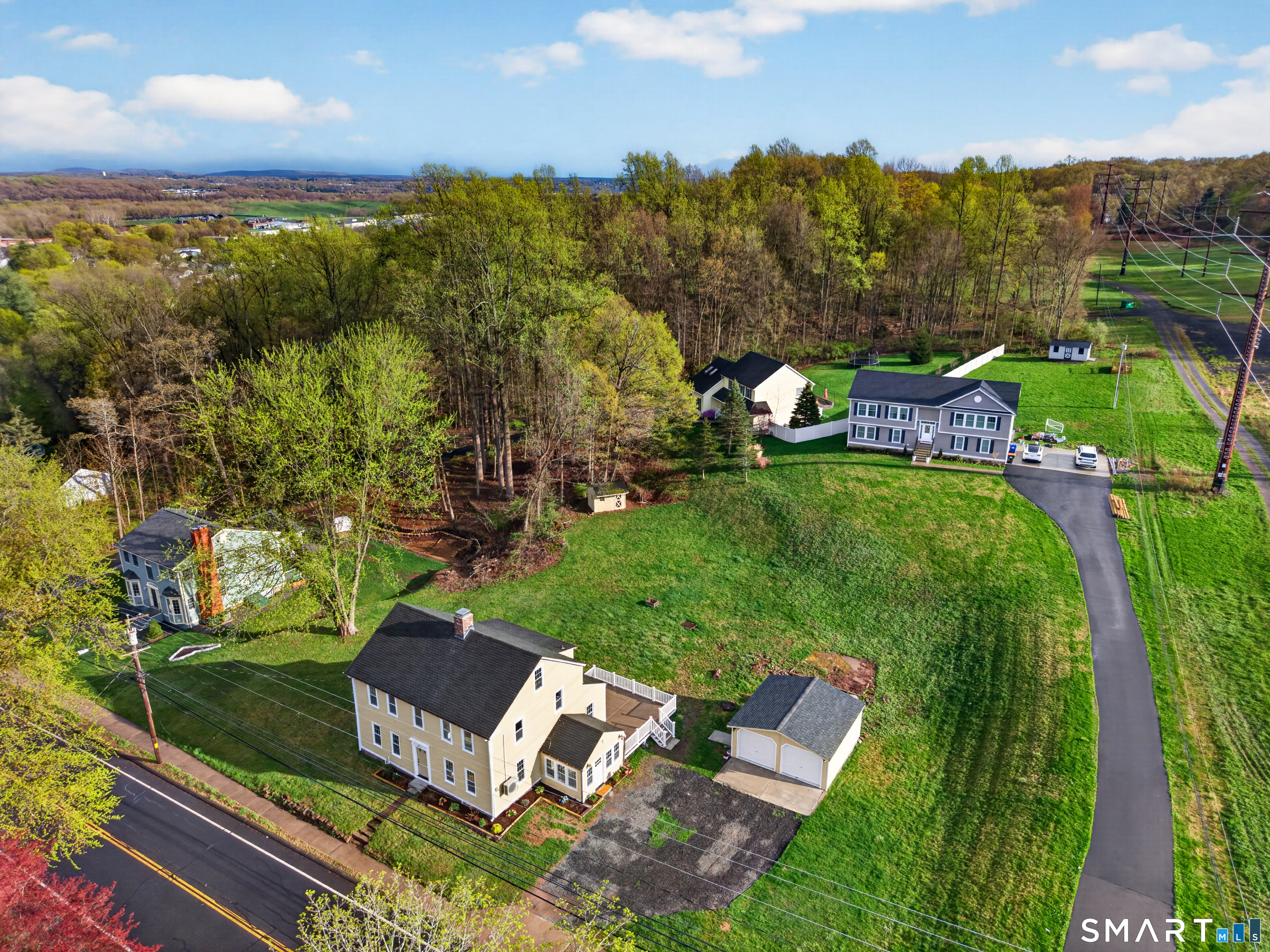 380 Main Street Meriden, CT 06451 - Photo 36 of 40 a view of a garden with houses