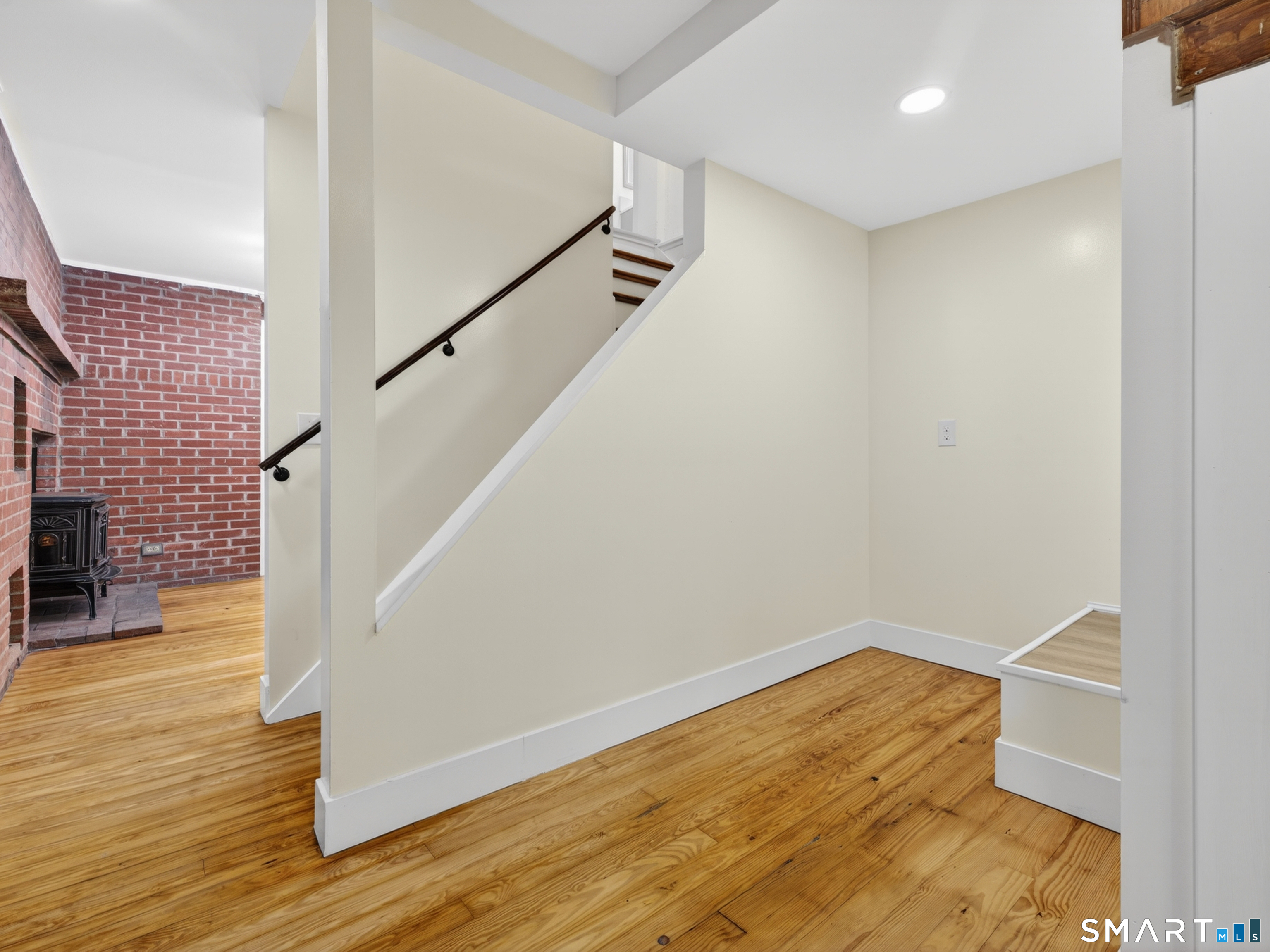 380 Main Street Meriden, CT 06451 - Photo 4 of 40 a view of small space with wooden floor and white walls
