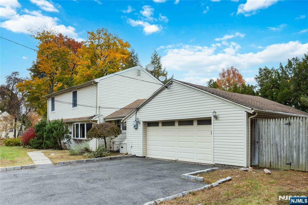 366 Spring Valley Road Paramus, NJ 07652 - Photo 23 of 23 a view of a house with a patio