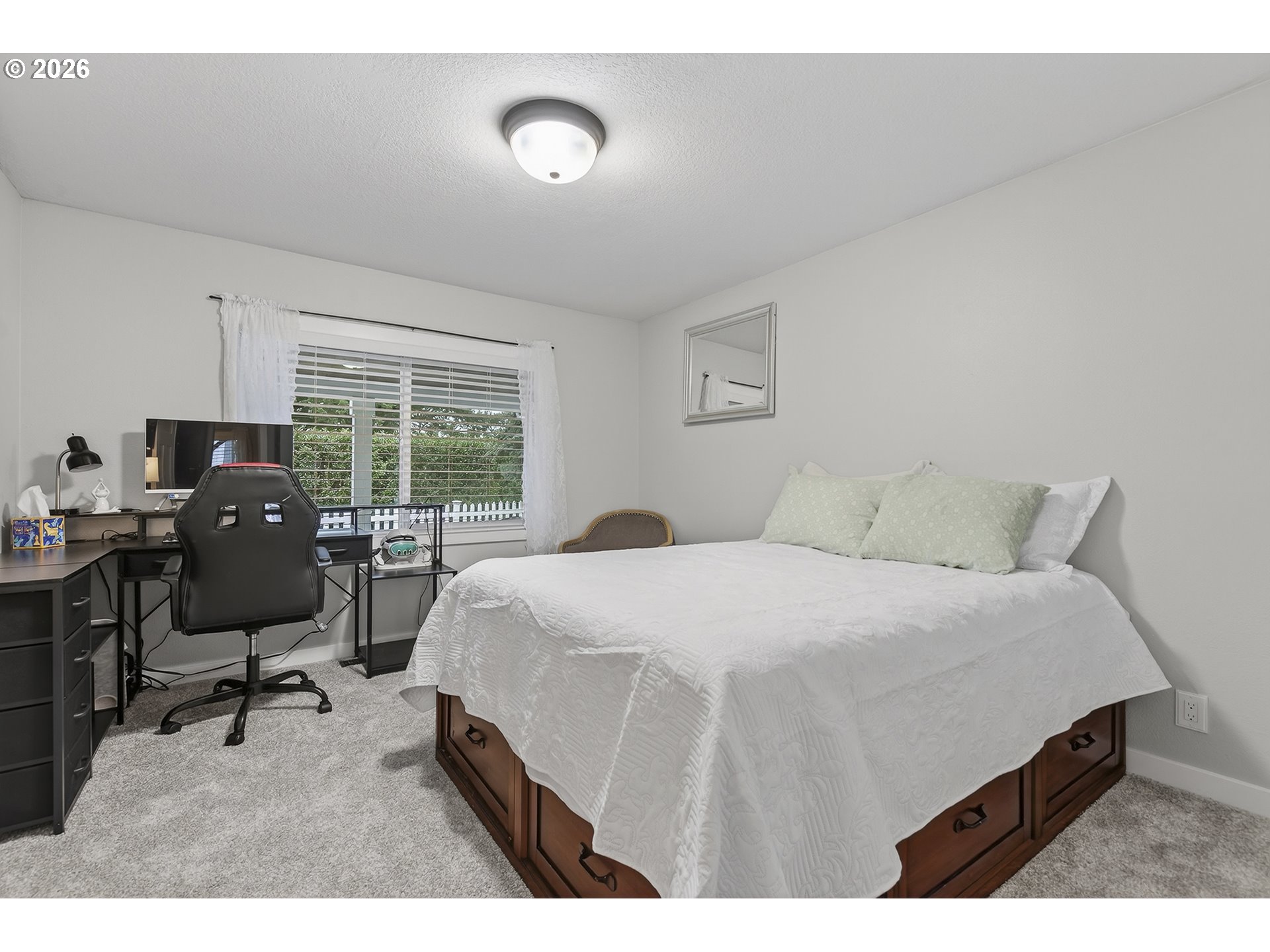 615 Northeast 257th Avenue Camas, WA 98607 - Photo 23 of 48 a spacious bedroom with a bed and large windows