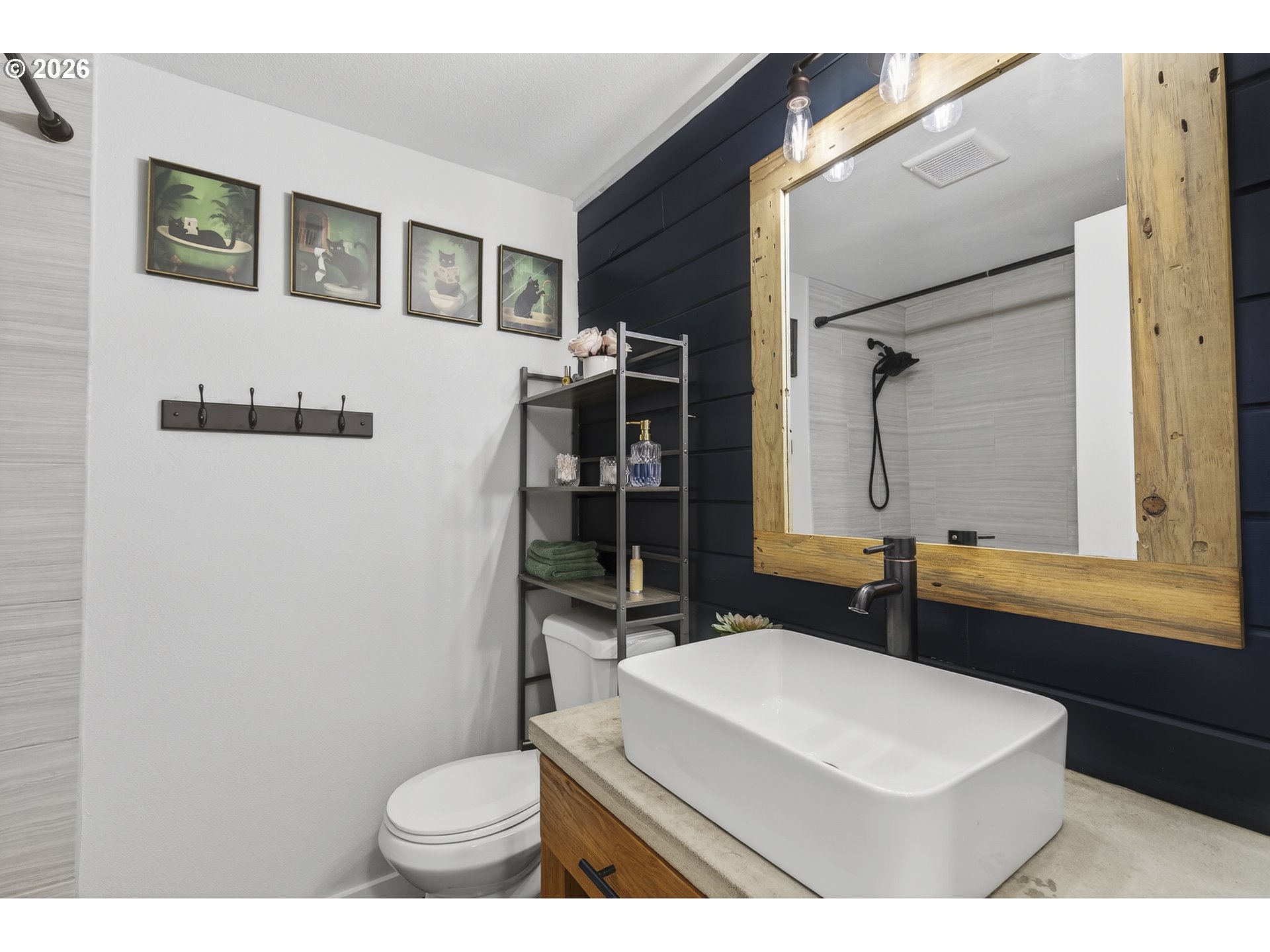 615 Northeast 257th Avenue Camas, WA 98607 - Photo 25 of 48 a bathroom with a sink a toilet a mirror and shower