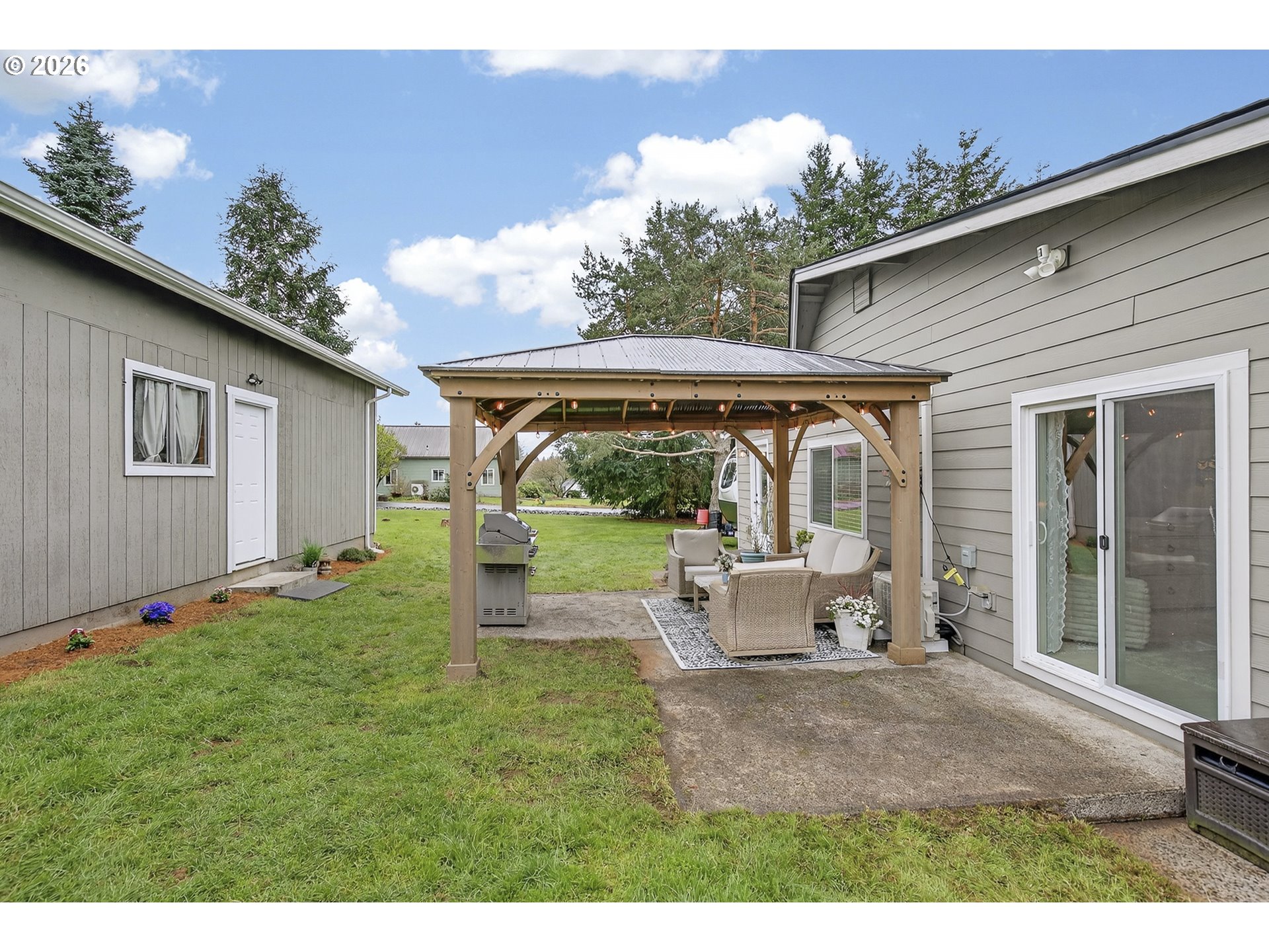 615 Northeast 257th Avenue Camas, WA 98607 - Photo 32 of 48 a view of an house with backyard space and garden