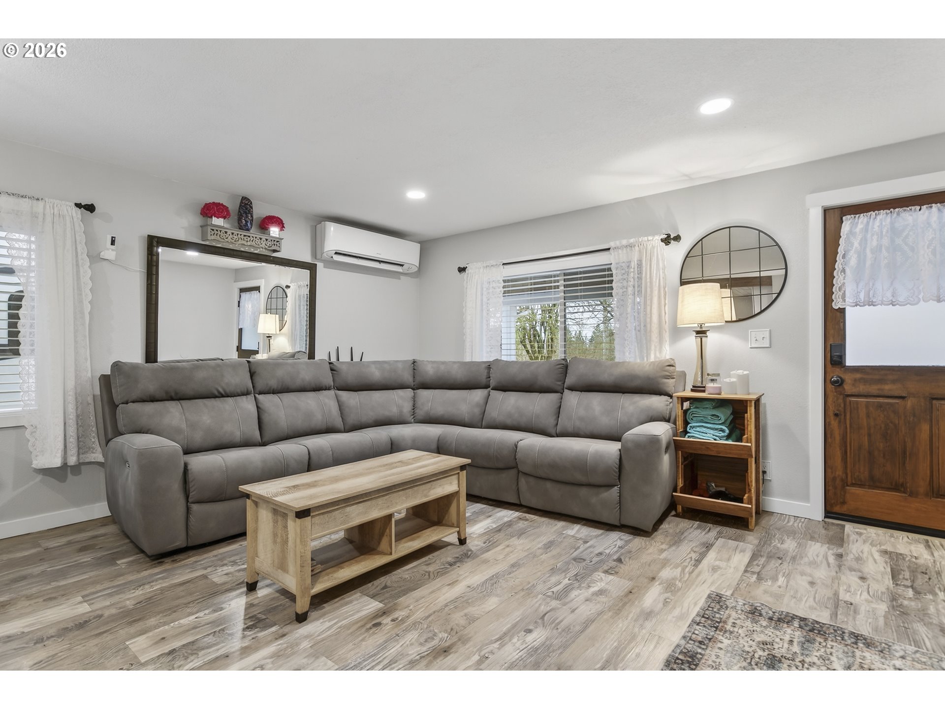 615 Northeast 257th Avenue Camas, WA 98607 - Photo 8 of 48 a living room with furniture and a wooden floor