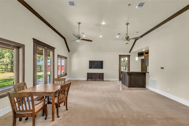 a view of a livingroom with furniture window and wooden floor