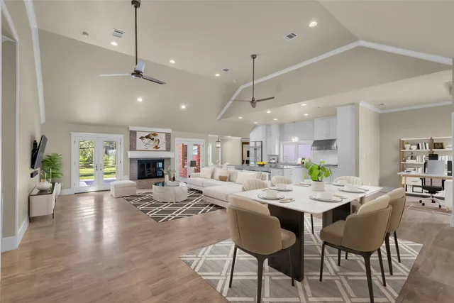 a view of a workspace with furniture and a potted plant