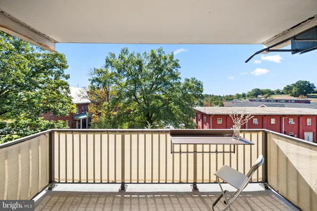 a view of a street from a balcony