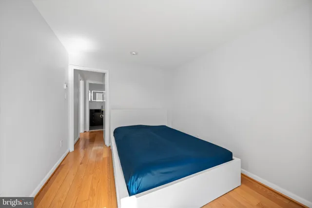 a view of kitchen and wooden floor