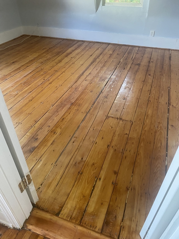 24 Gordon Avenue, Unit 24 Boston, MA 02136 - Photo 9 of 13 a view of a room with wooden floor