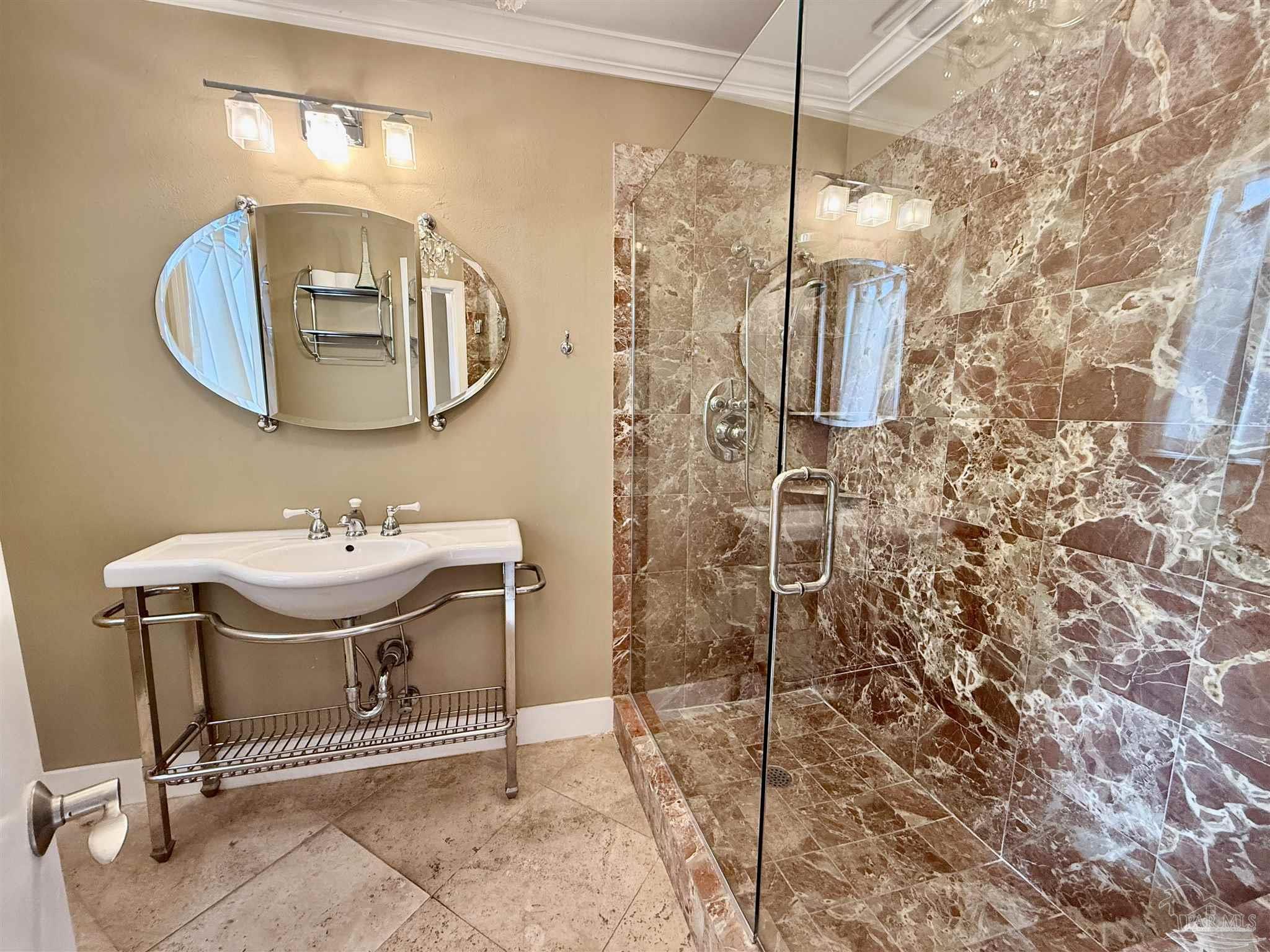 1717 Yates Avenue Pensacola, FL 32503 - Photo 15 of 47 a bathroom with a sink and mirror