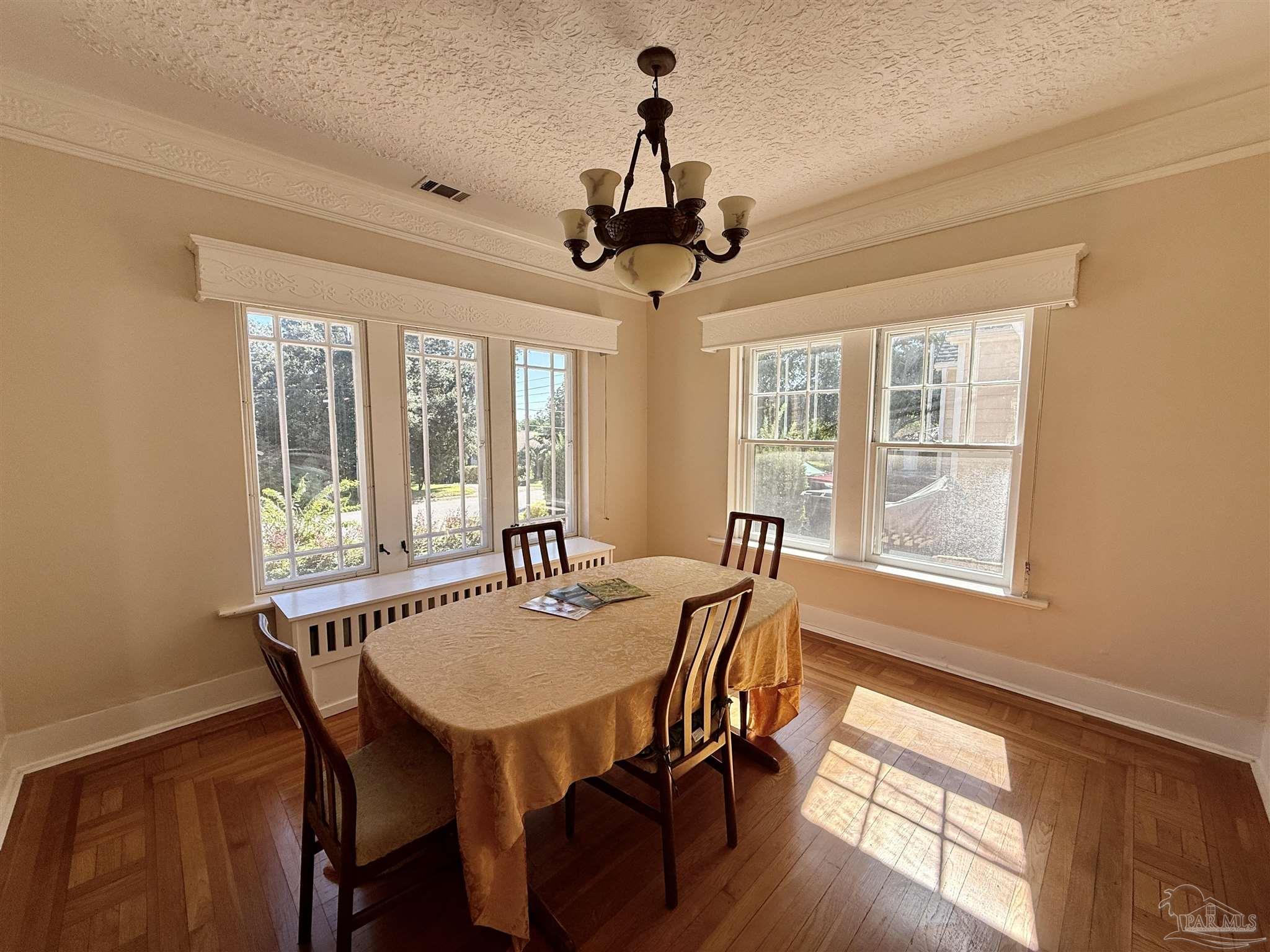 1717 Yates Avenue Pensacola, FL 32503 - Photo 2 of 47 a view of a dining room with furniture window and wooden floor