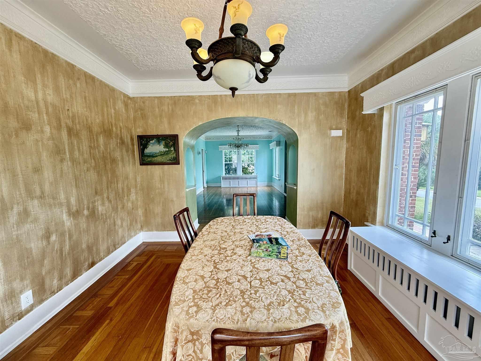 1717 Yates Avenue Pensacola, FL 32503 - Photo 33 of 47 a view of a dining room with furniture window and wooden floor