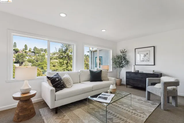 a view of a town with mountains in the background