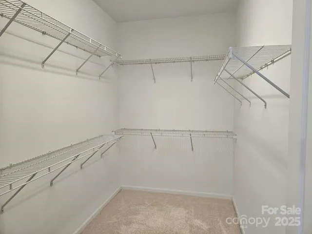 a view of a room with racks on the wall