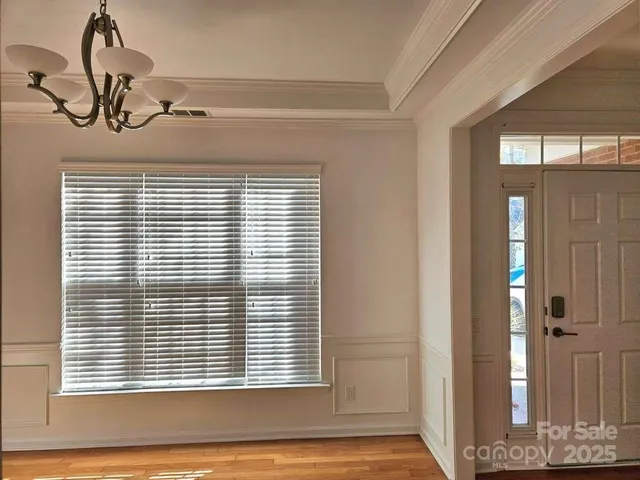 a view of a livingroom and a window