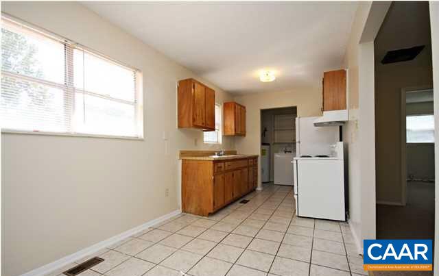3 Appletree Road Palmyra, VA 22963 - Photo 3 of 14 a kitchen with a refrigerator and a stove top oven