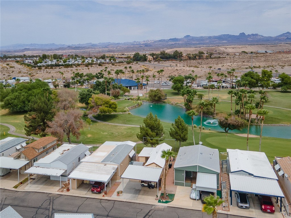 2000 Ramar Road, Unit 612 Bullhead City, AZ 86442 - Photo 44 of 77 Aerial view of residential area featuring a water and mountain view and a golf course