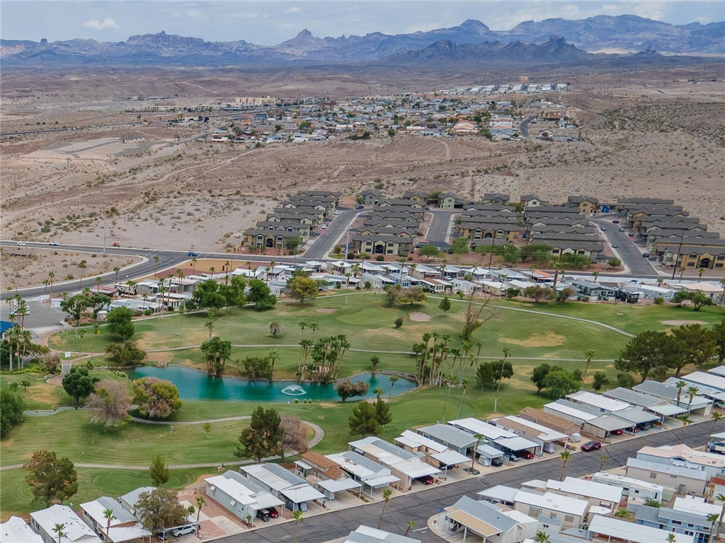 2000 Ramar Road, Unit 612 Bullhead City, AZ 86442 - Photo 52 of 77 Aerial view of residential area featuring a water and mountain view and a local golf course