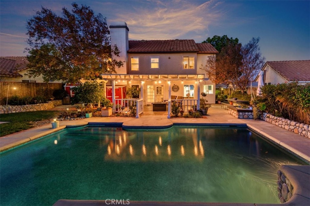 20637 Mesa Oak Drive Riverside, CA 92508 - Photo 13 of 66 a view of swimming pool with outdoor seating and lake view