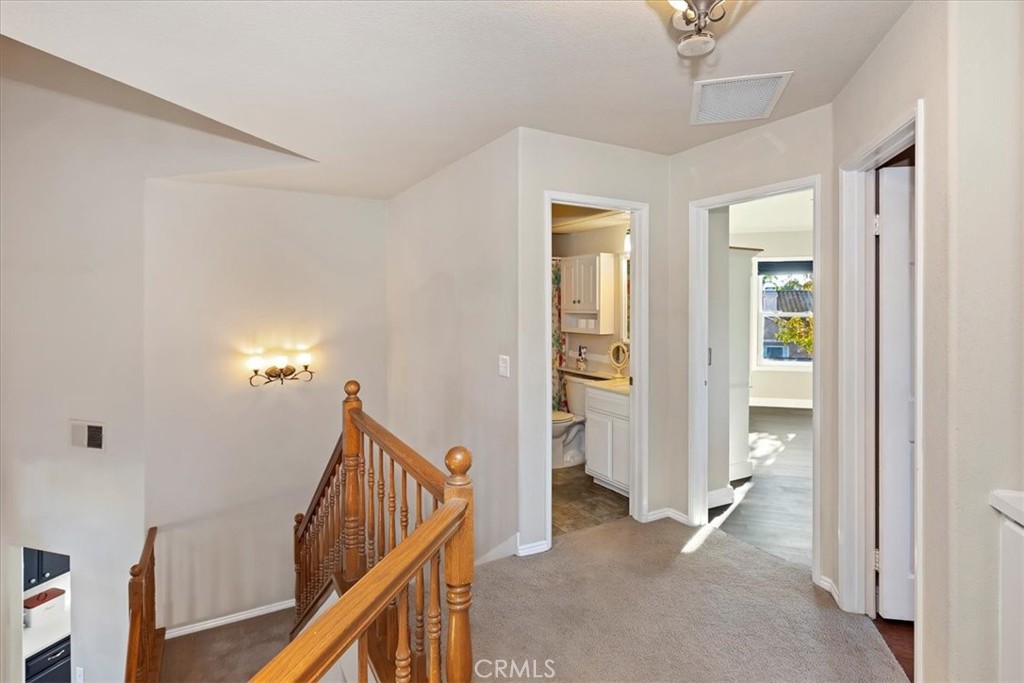 20637 Mesa Oak Drive Riverside, CA 92508 - Photo 35 of 66 a view of a livingroom with stairs and furniture