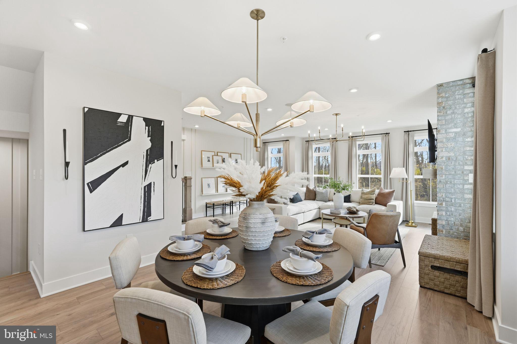 405 Pennybrook Court, Unit 3 Flourtown, PA 19031 - Photo 11 of 31 a view of a dining room with furniture window and wooden floor