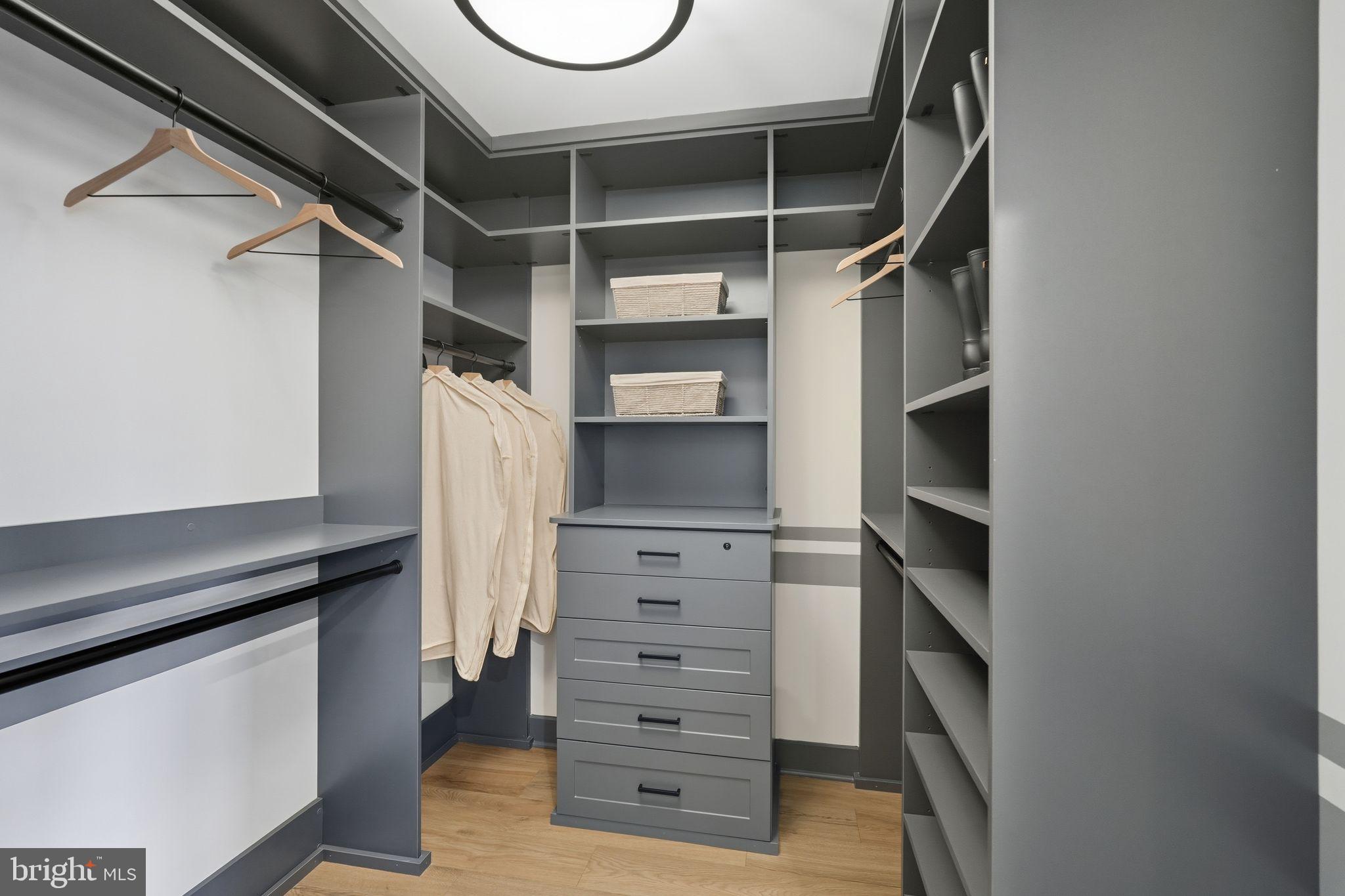 405 Pennybrook Court, Unit 3 Flourtown, PA 19031 - Photo 25 of 31 a view of walk in closet with clothes and shoes