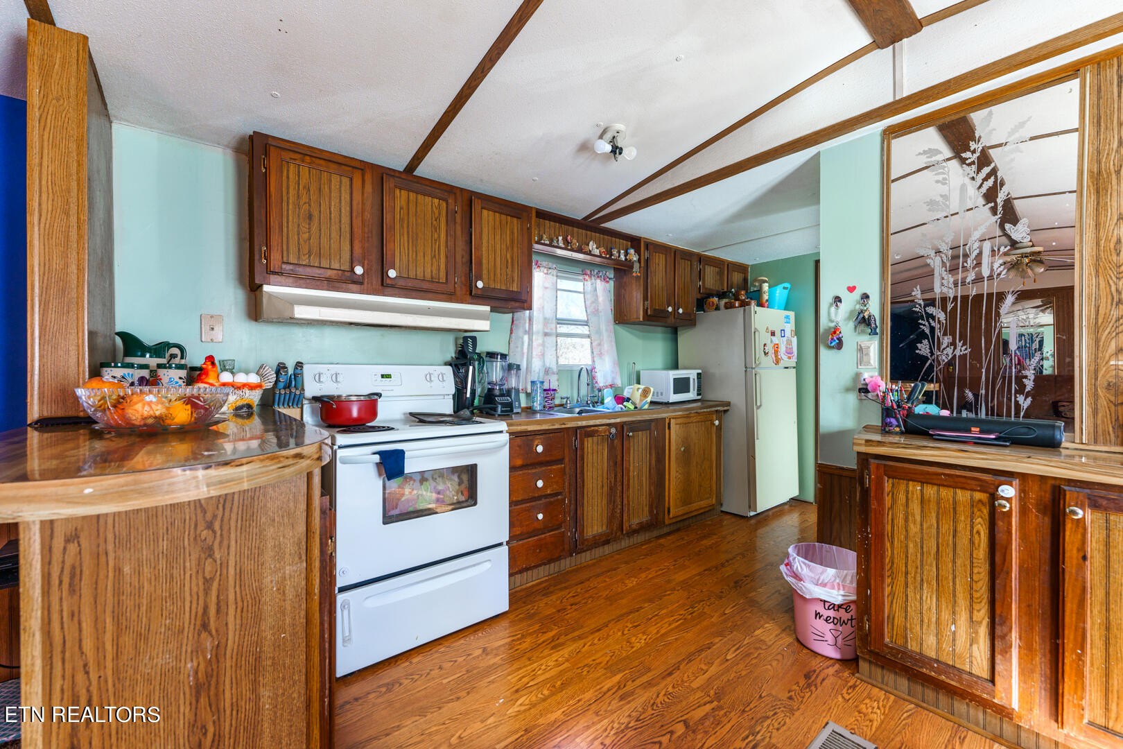 9520 Raccoon Woods Road Heiskell, TN 37754 - Photo 7 of 15 a kitchen with a sink cabinets and wooden floor