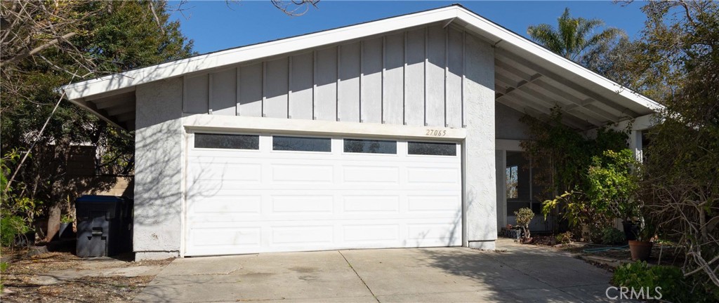 a view of a house with a garage