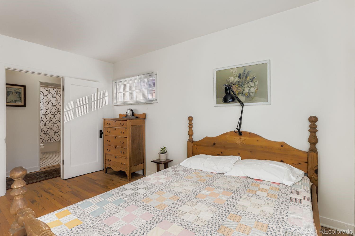 1010 9th Street Boulder, CO 80302 - Photo 19 of 28 a bedroom with a bed and a closet