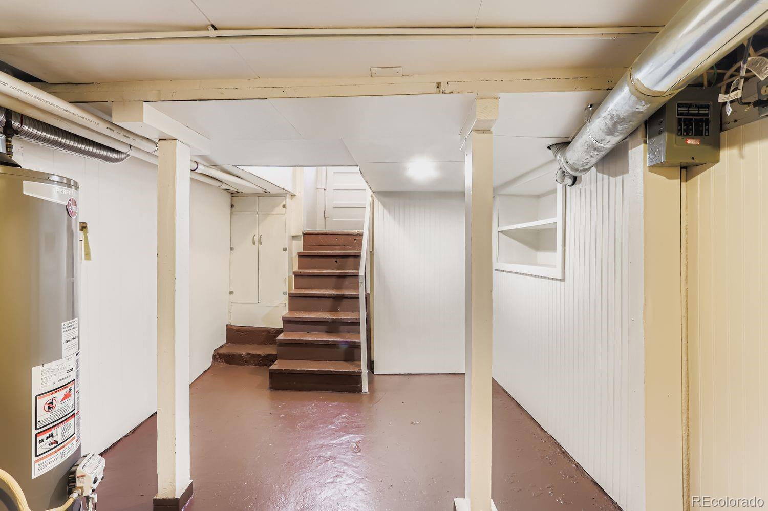 1010 9th Street Boulder, CO 80302 - Photo 24 of 28 a view of entryway with stairs and wooden floor