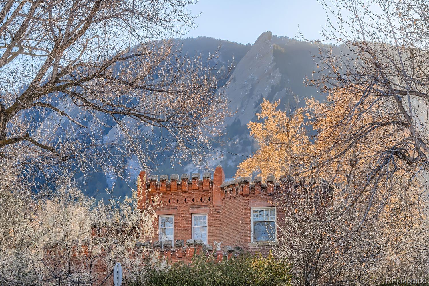 1010 9th Street Boulder, CO 80302 - Photo 28 of 28 a view of a house with a yard