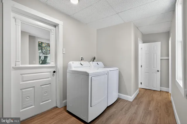 a utility room with dryer and washer