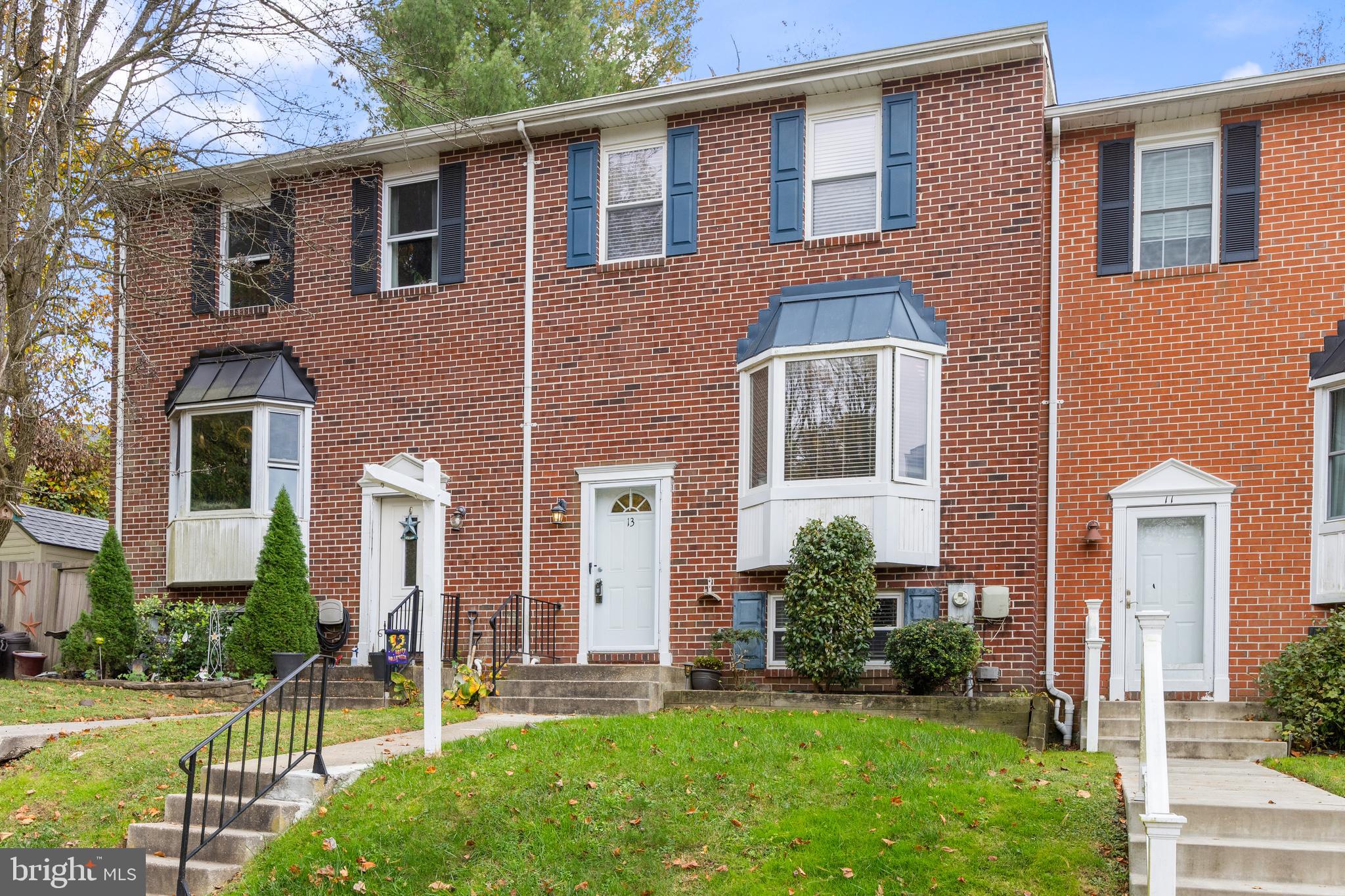 13 Sylvanhurst Court Baltimore, MD 21236 - Photo 2 of 35 a front view of a house with a yard