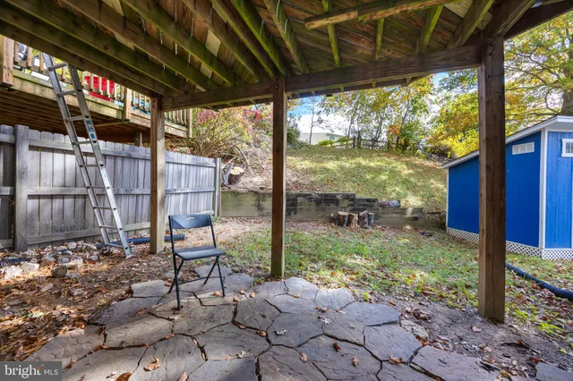 a view of a porch with furniture