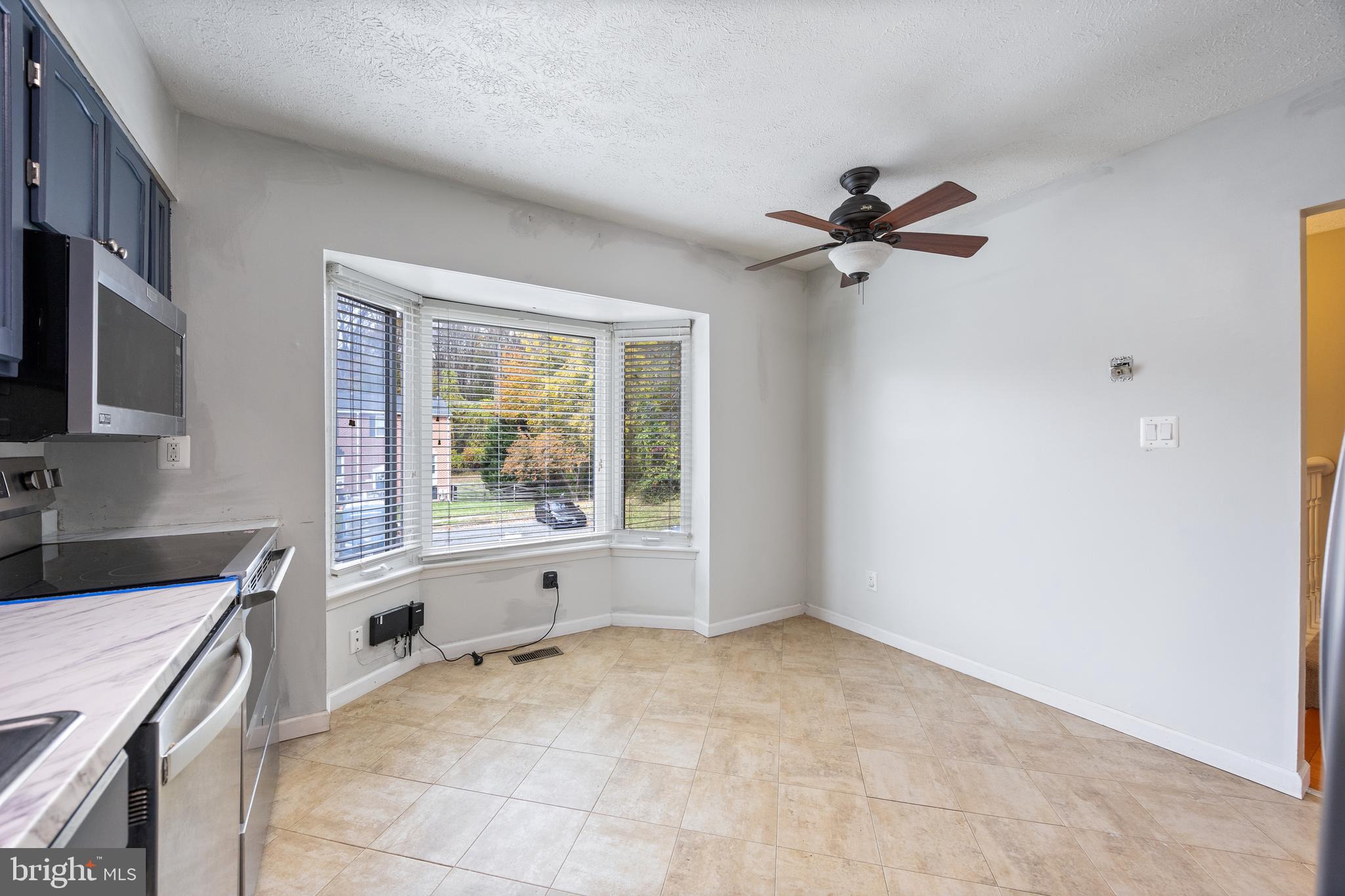 13 Sylvanhurst Court Baltimore, MD 21236 - Photo 6 of 35 a view of a kitchen with a sink and a window