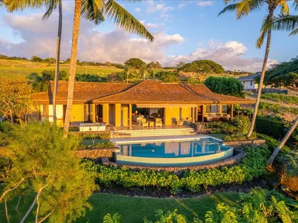 a view of a house with a swimming pool