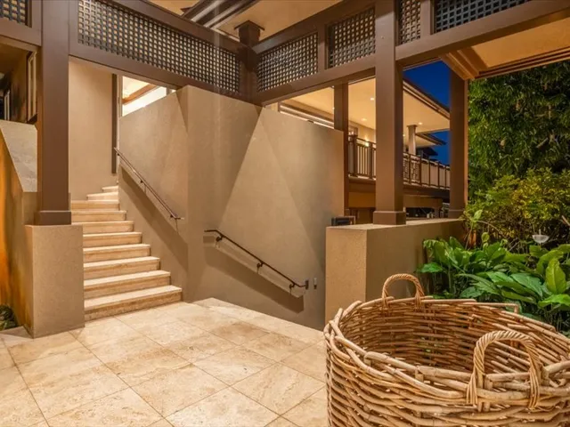 a view of a backyard with a patio