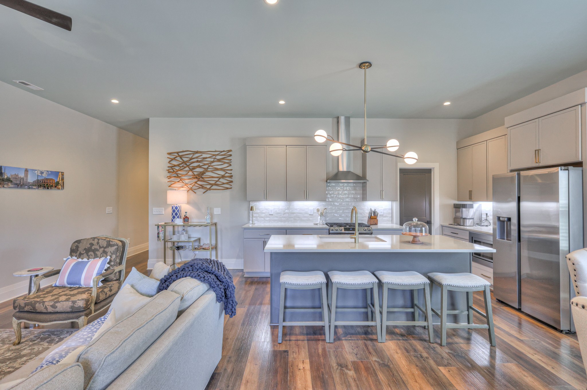 1108 Noble Loop Nashville, TN 37211 - Photo 12 of 45 a kitchen with granite countertop kitchen island stainless steel appliances a dining table and chairs