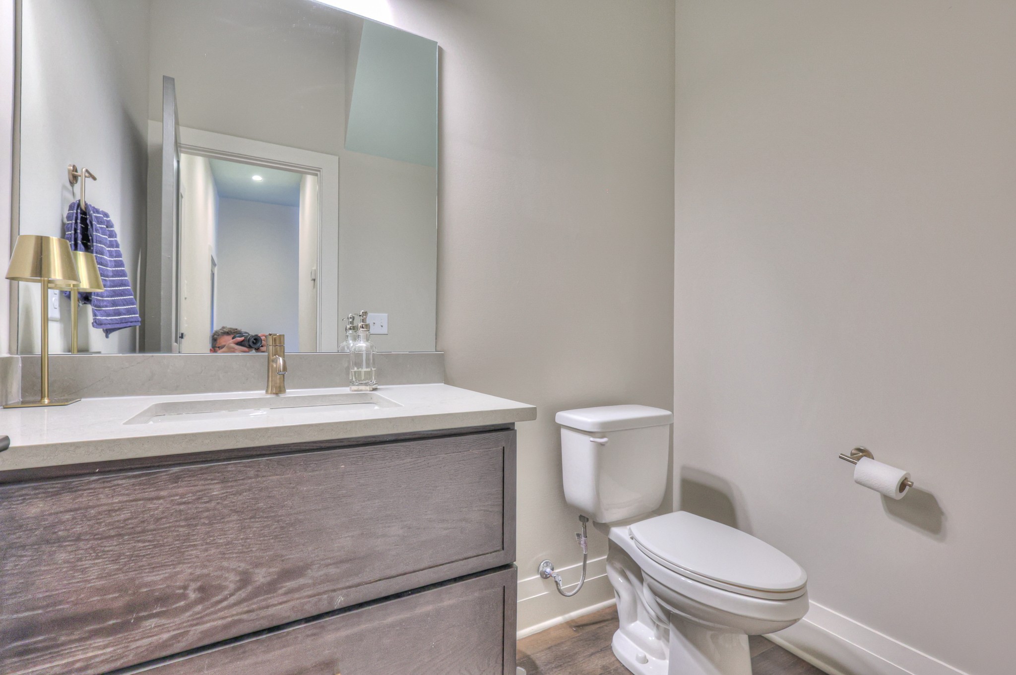 1108 Noble Loop Nashville, TN 37211 - Photo 16 of 45 a bathroom with a granite countertop toilet a sink and a mirror