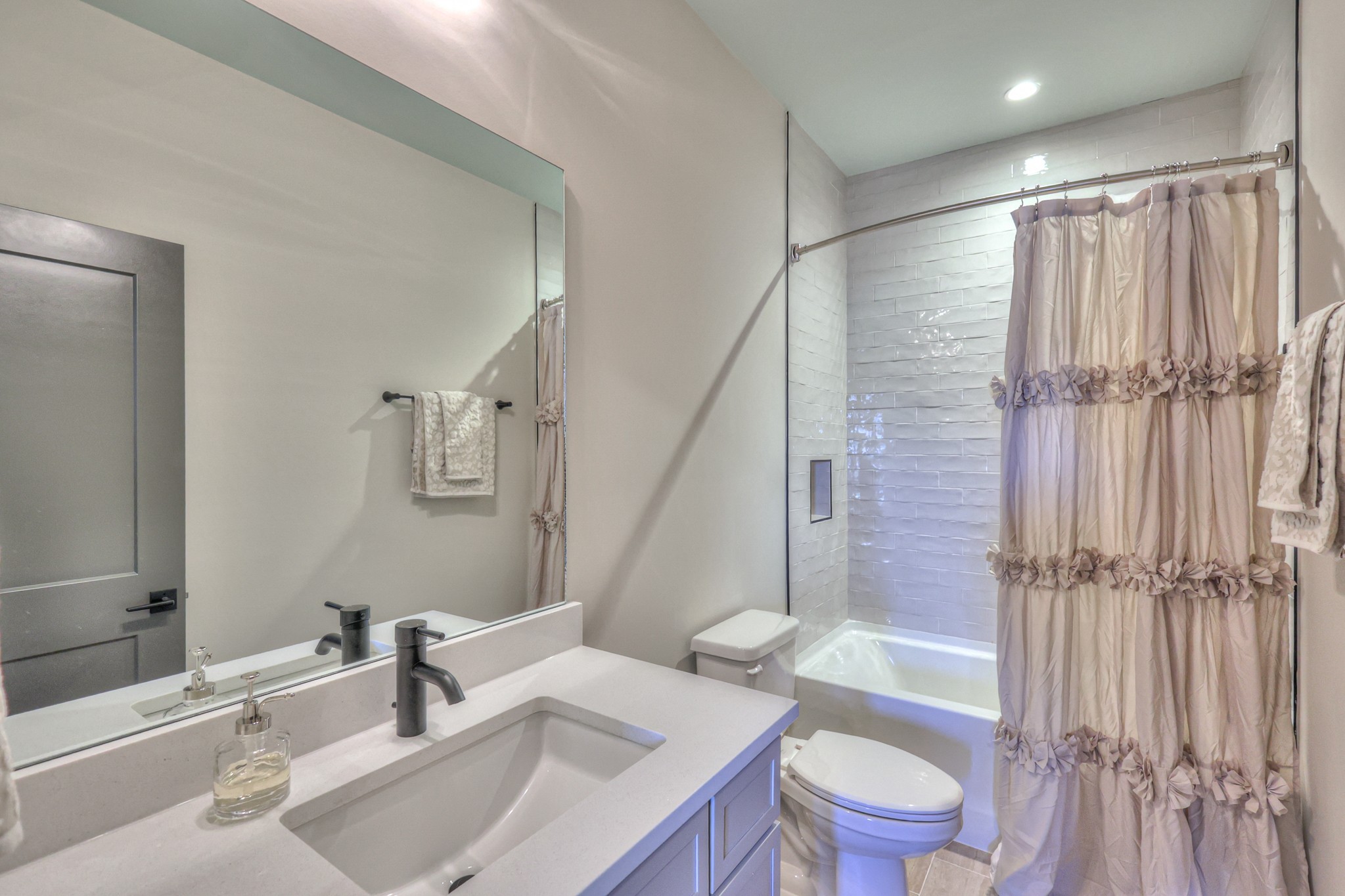 1108 Noble Loop Nashville, TN 37211 - Photo 31 of 45 a bathroom with a sink toilet a mirror and shower