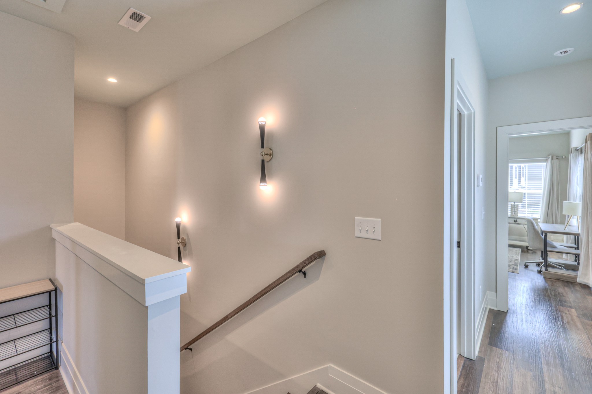 1108 Noble Loop Nashville, TN 37211 - Photo 36 of 45 a view of a hallway with wooden floor windows and a living room