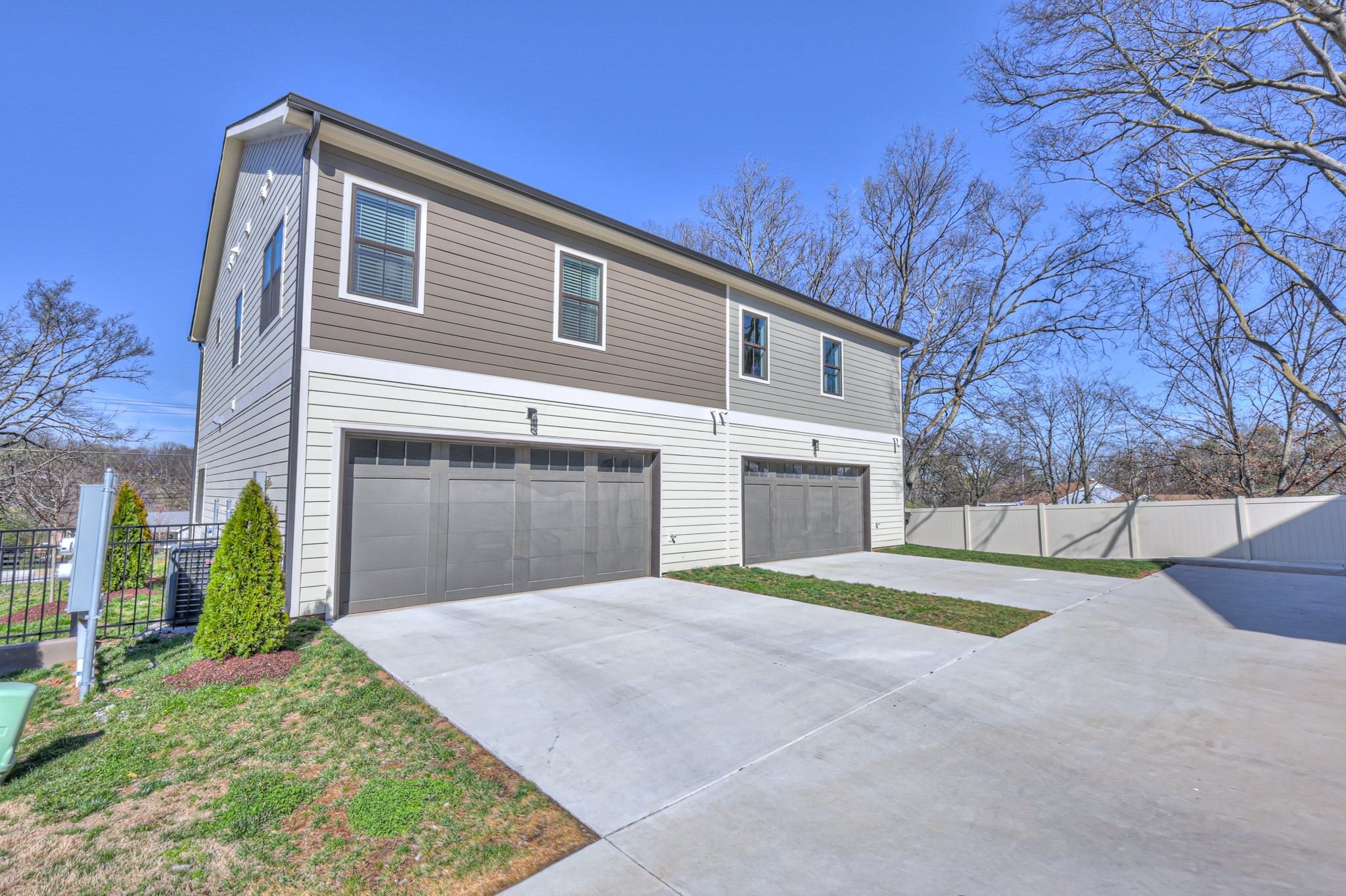 1108 Noble Loop Nashville, TN 37211 - Photo 45 of 45 a front view of a house with a yard and garage