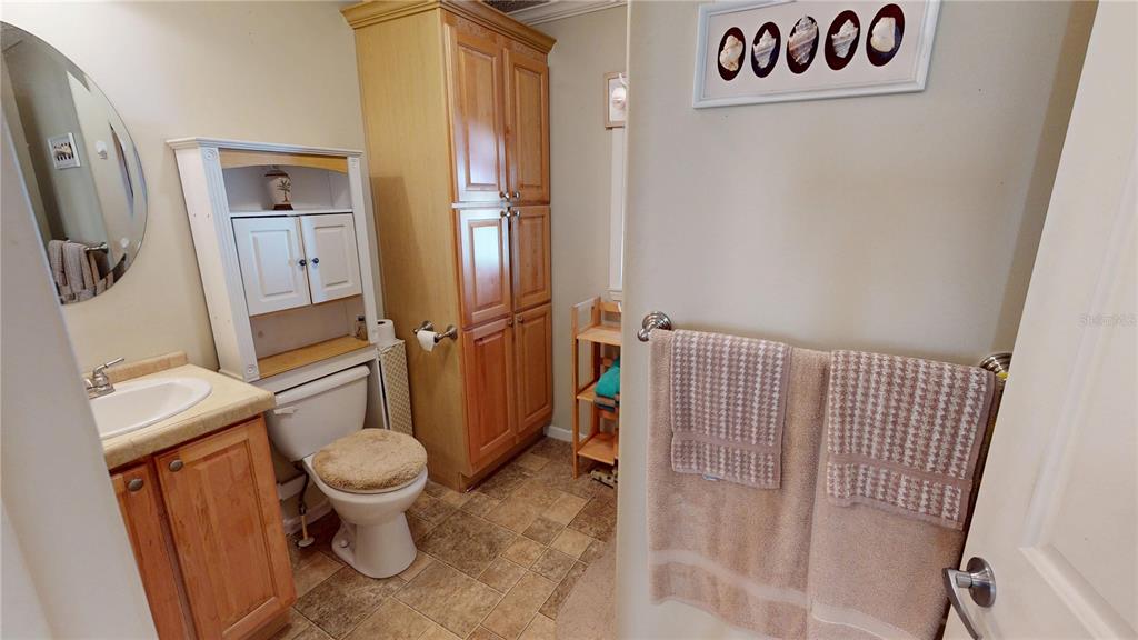 10101 Burnt Store Road, Unit 141 Punta Gorda, FL 33950 - Photo 14 of 34 a bathroom with a toilet and a shower