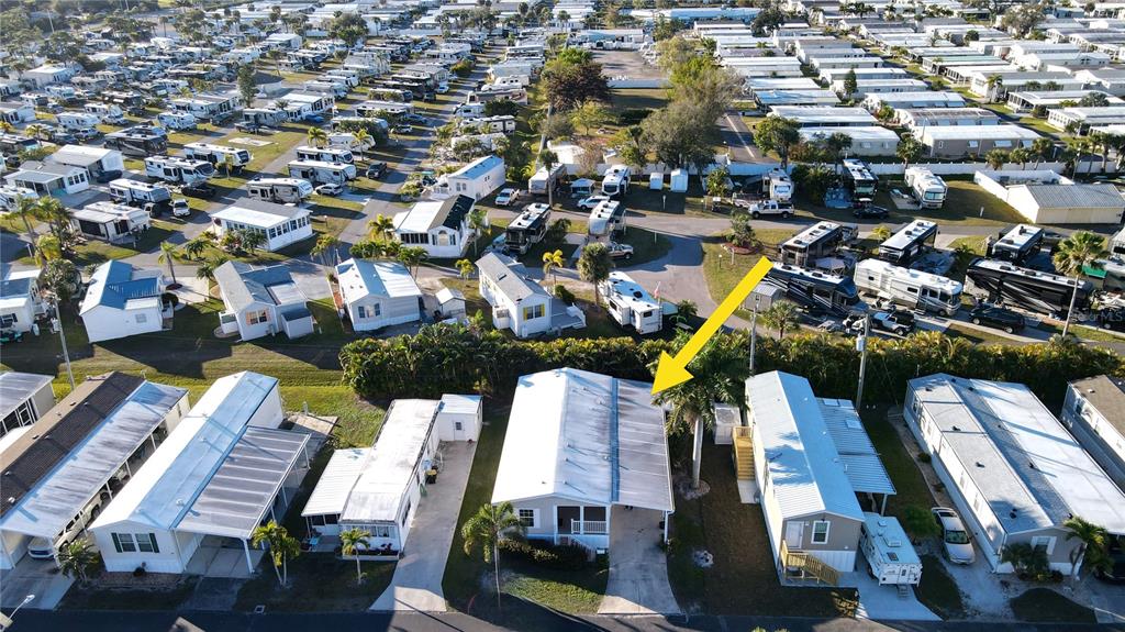 10101 Burnt Store Road, Unit 141 Punta Gorda, FL 33950 - Photo 24 of 34 an aerial view of residential houses with outdoor space