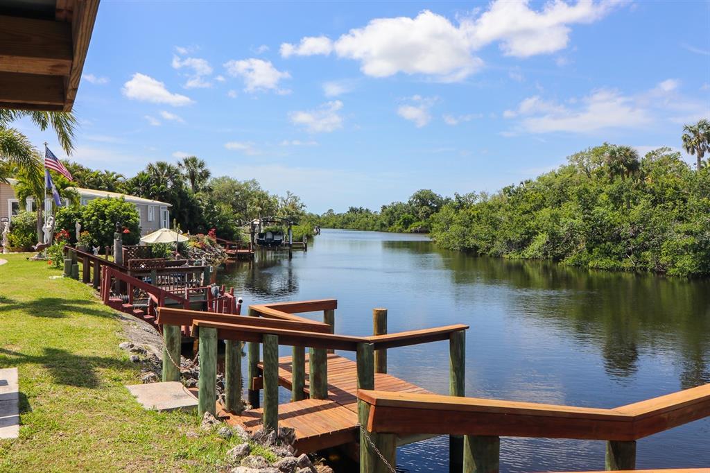 10101 Burnt Store Road, Unit 141 Punta Gorda, FL 33950 - Photo 34 of 34 a view of a lake from a balcony