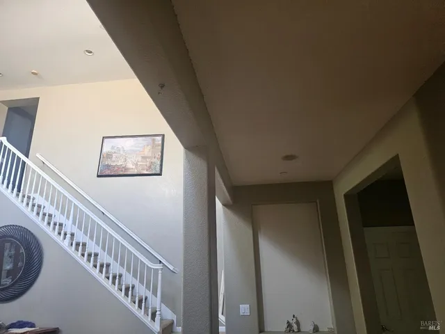 a view of staircase with large window