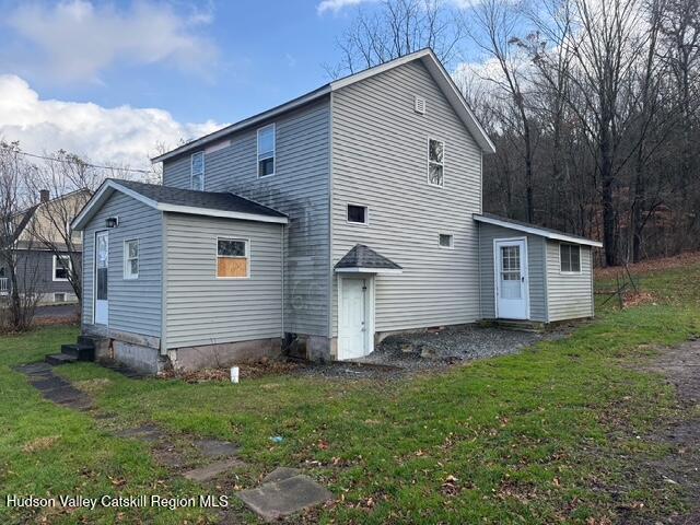 30 Highland Avenue Kerhonkson, NY 12446 - Photo 14 of 14 a view of a house with a yard