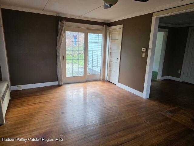 30 Highland Avenue Kerhonkson, NY 12446 - Photo 5 of 14 a view of an empty room with wooden floor and a window