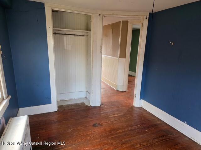 30 Highland Avenue Kerhonkson, NY 12446 - Photo 6 of 14 a view of an empty room with wooden floor and a window