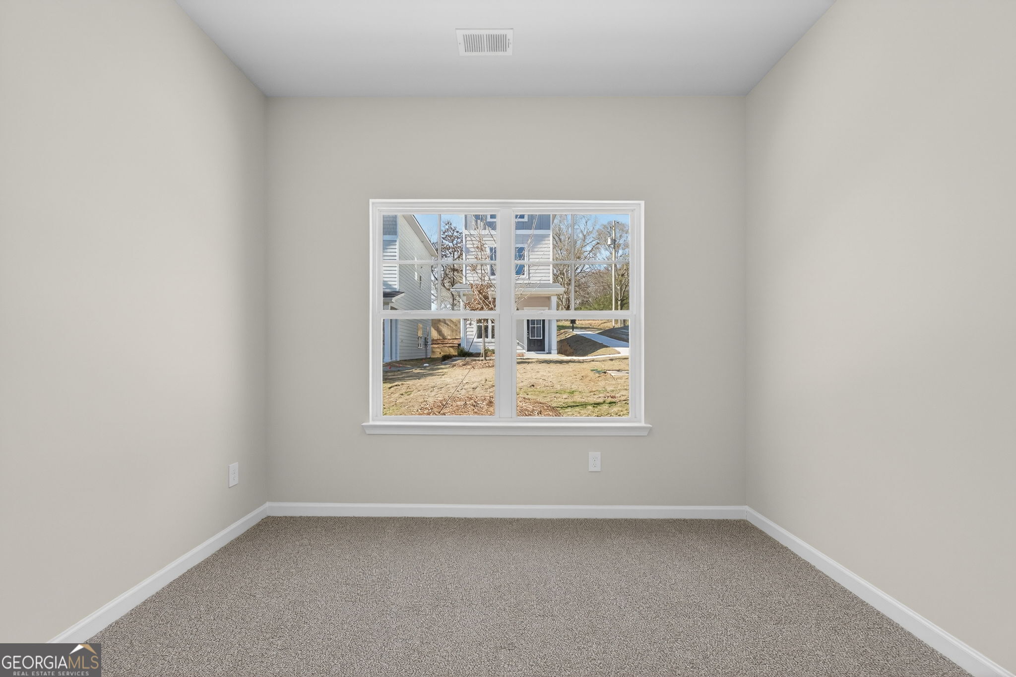 207 Riverview Road Franklin, GA 30217 - Photo 17 of 24 an empty room with a window