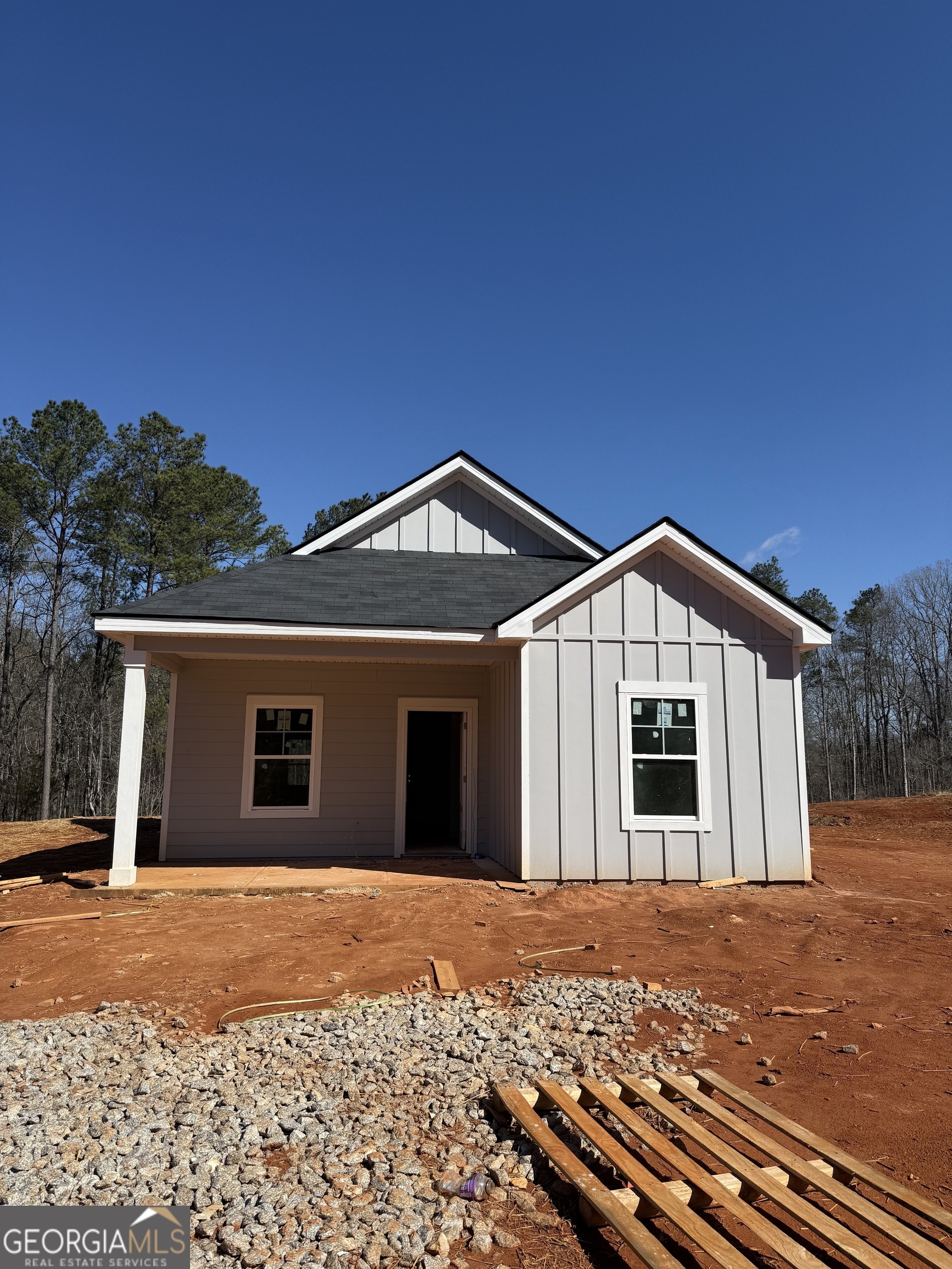 207 Riverview Road Franklin, GA 30217 - Photo 2 of 24 a front view of a house with a yard